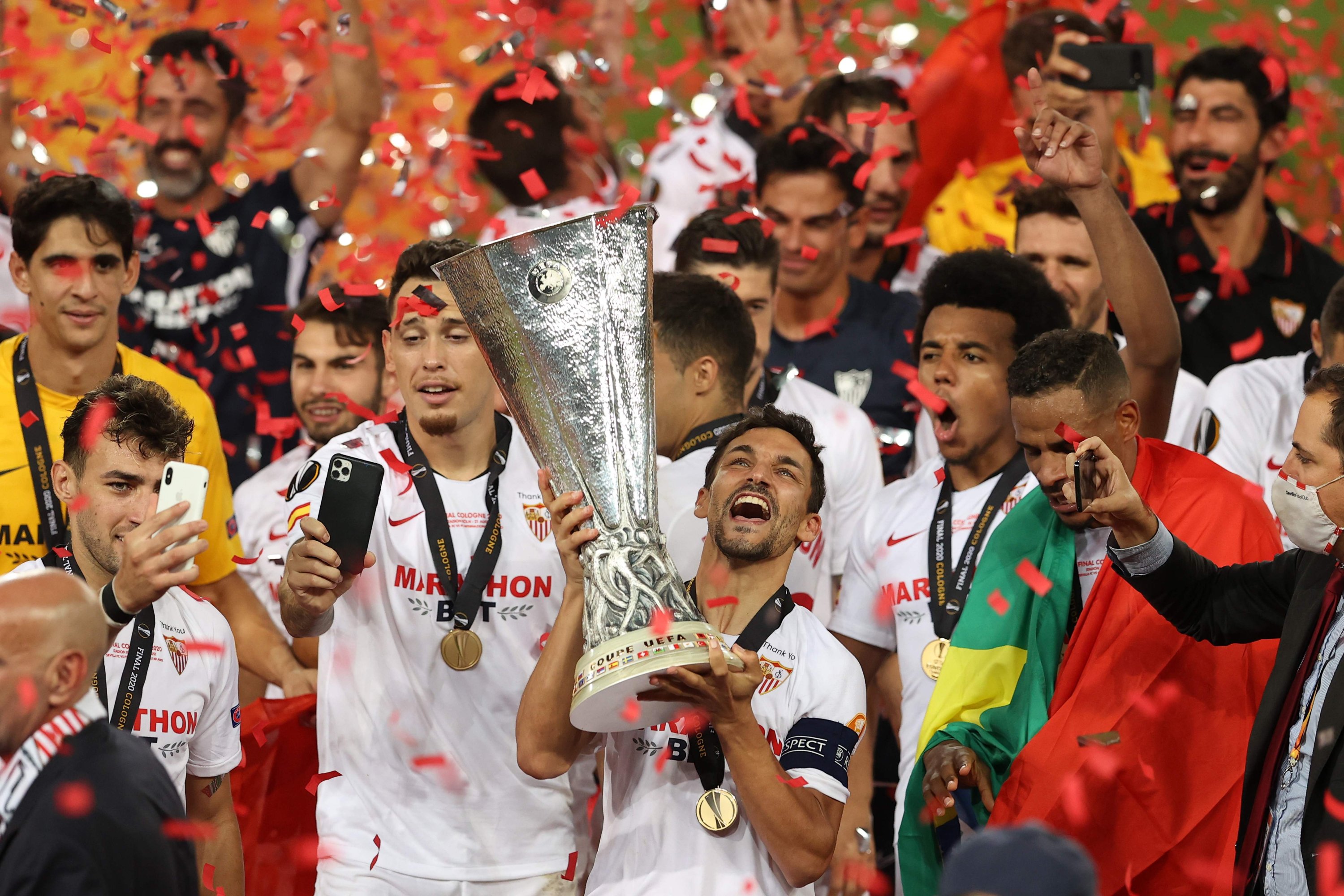  Sevilla players celebrate their victory in the 2020 UEFA Europa League final against Inter Milan.