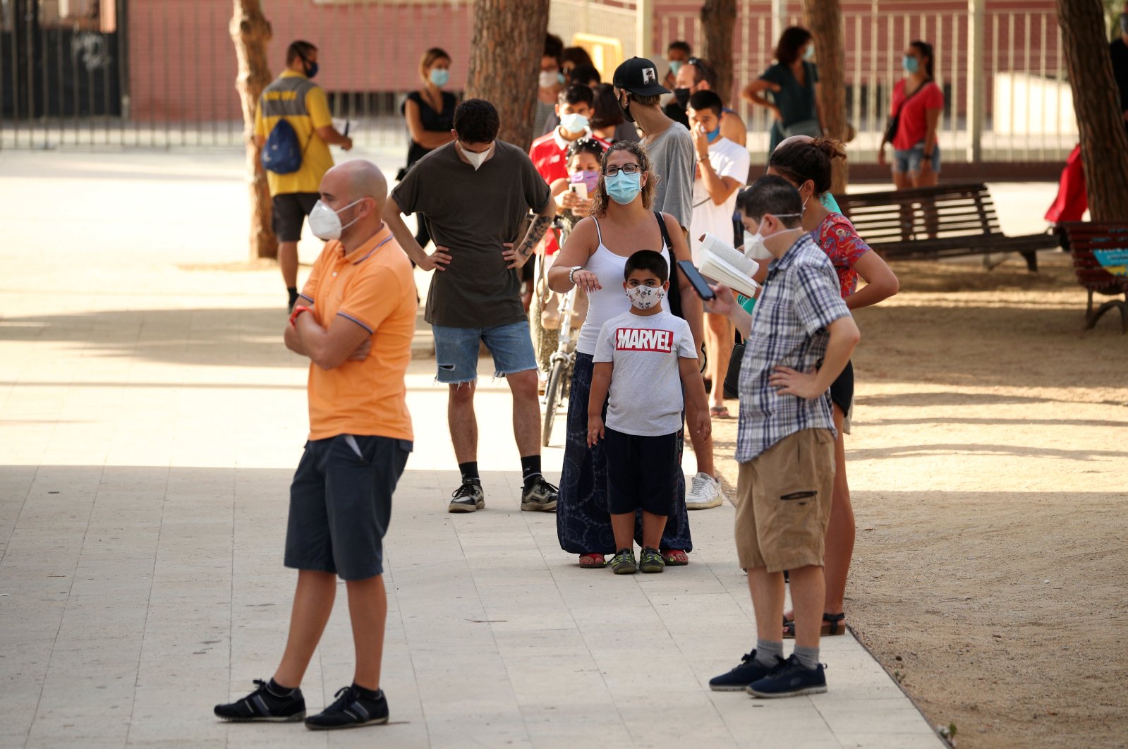 People queue to get tested for the coronavirus at Hospitalet del Llobregat in Barcelona, Spain, Aug. 21, 2020. (Reuters Photo)