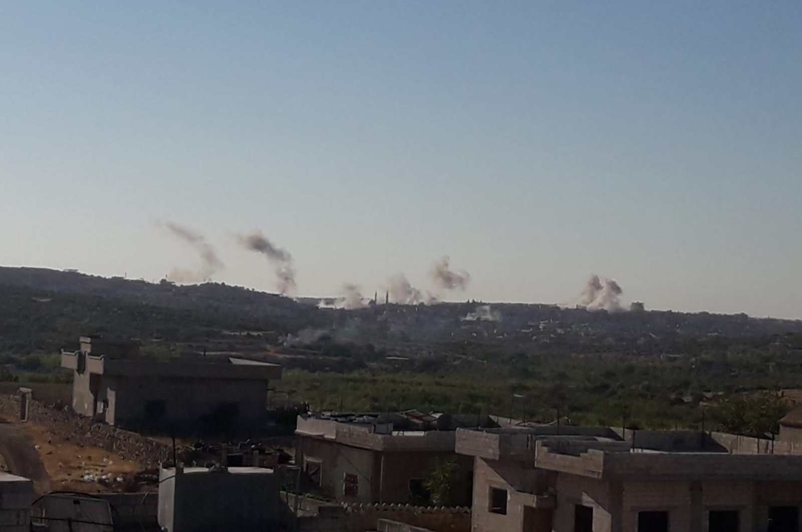 The Syrian regime forces hit Fattira village in the country's northwestern Idlib region, Aug. 20, 2020. (İHA Photo)