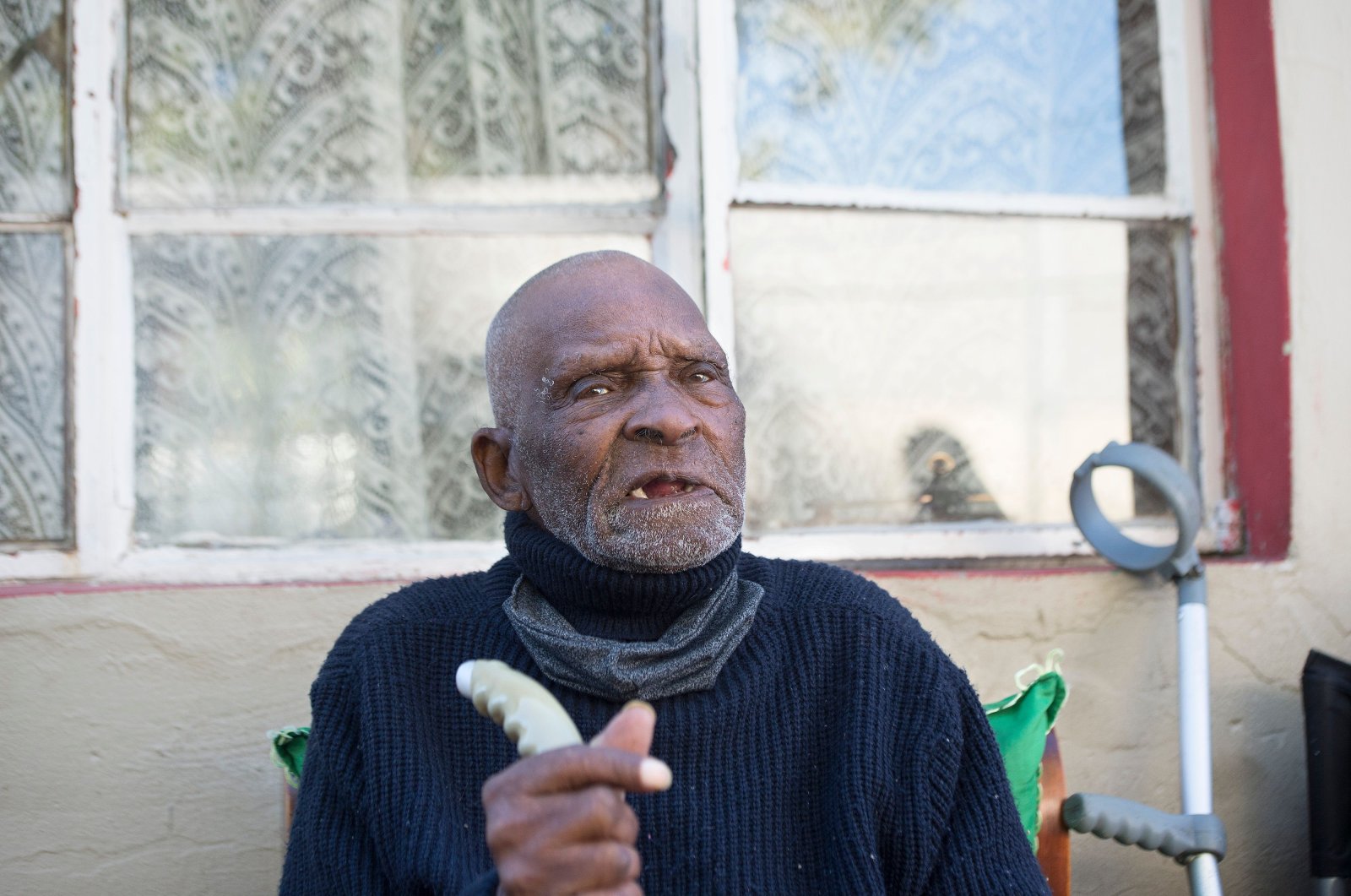 Fredie Blom talks about his recollections as he celebrates his 116th birthday at his home in Delft, near Cape Town on May 8, 2020. (AFP Photo)