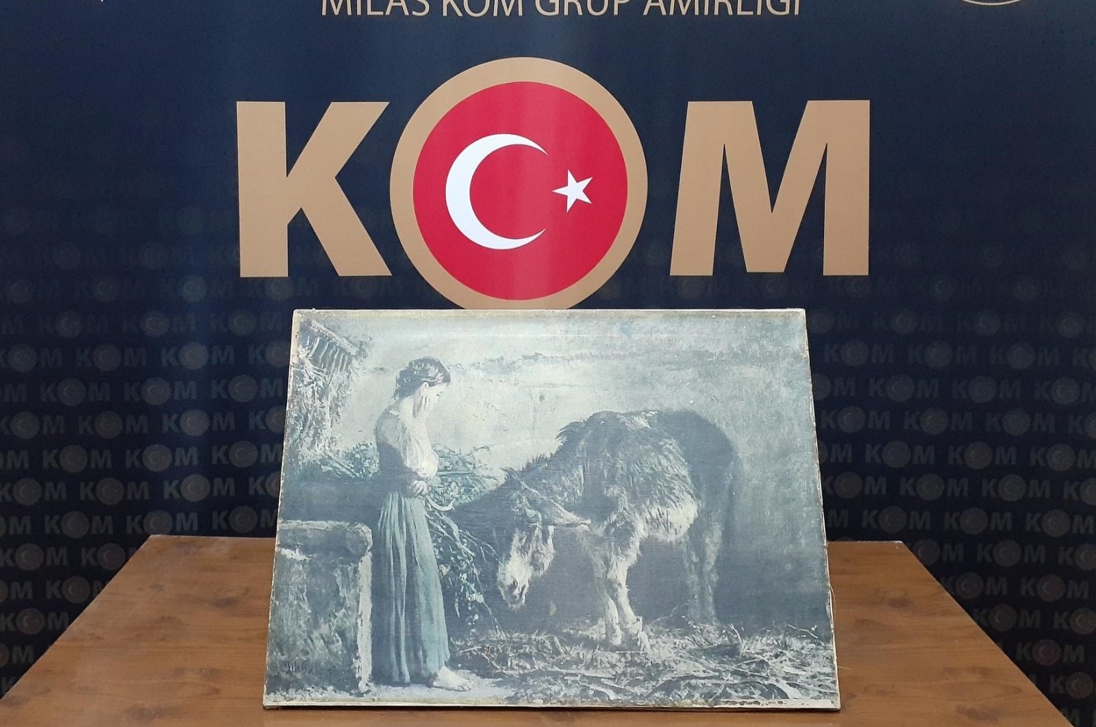 The seized painting allegedly signed by world-famous Italian artist Filippo Palizzi being displayed by the police department in southwestern Muğla, Turkey on August 22 2020. (AA Photo)