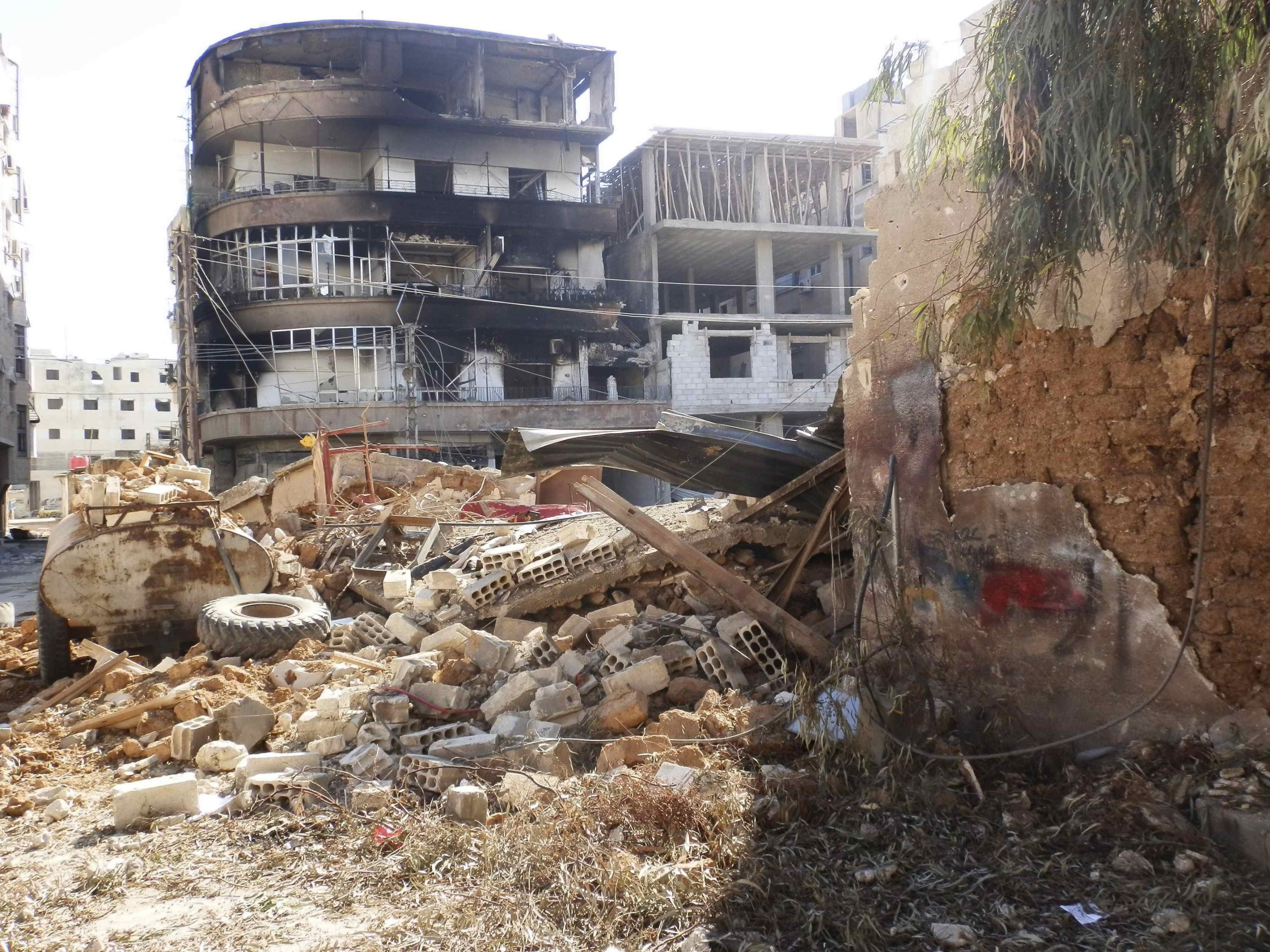 Syrians recall Daraya massacre that killed more than 500 | Daily Sabah