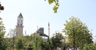 Some passersby are seen near the Clock Tower, Tirana, Albania, Aug. 22, 2020. (AA PHOTO) 