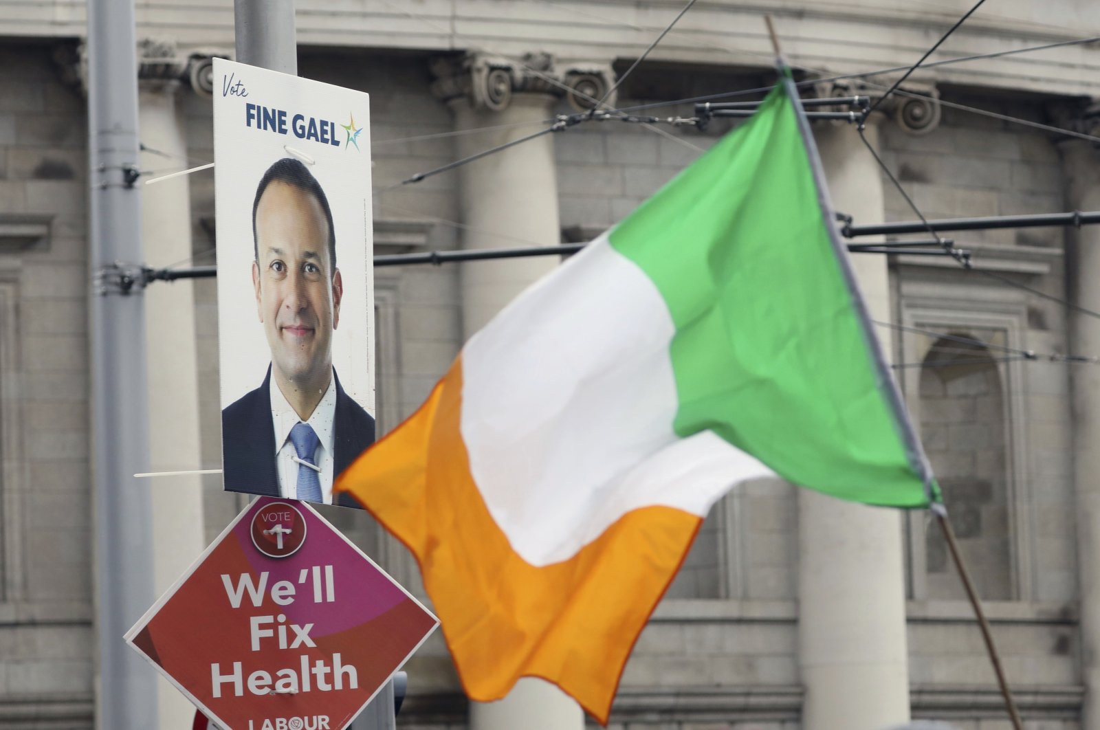 Election posters are displayed on lampposts in Dublin, Ireland, Feb. 7, 2020. (AP Photo)