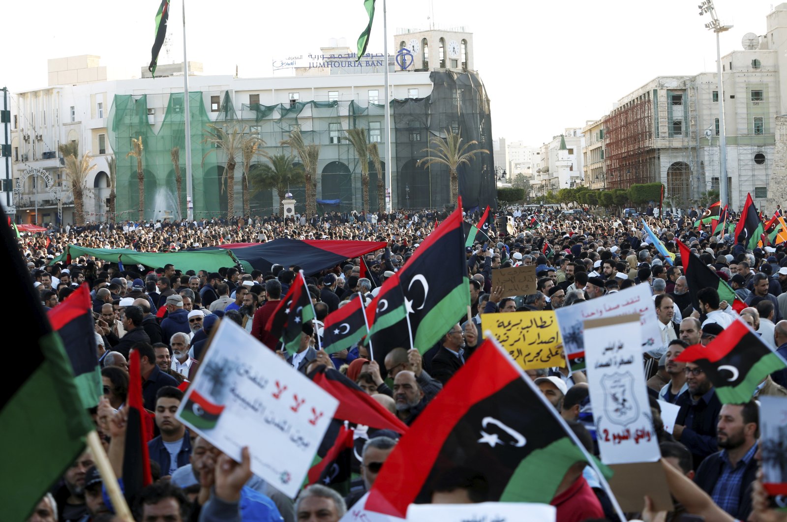 Libyan protesters attend a demonstration to demand an end to putschist Gen. Khalifa Haftar's offensive on the capital city, Martyrs Square, central Tripoli, April 12, 2019. (REUTERS Photo)