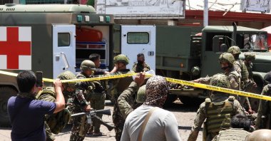 Filipino soldiers are pictured at the site of an explosion, in Jolo Island, Sulu province, Philippines, Aug. 24, 2020. (Reuters)