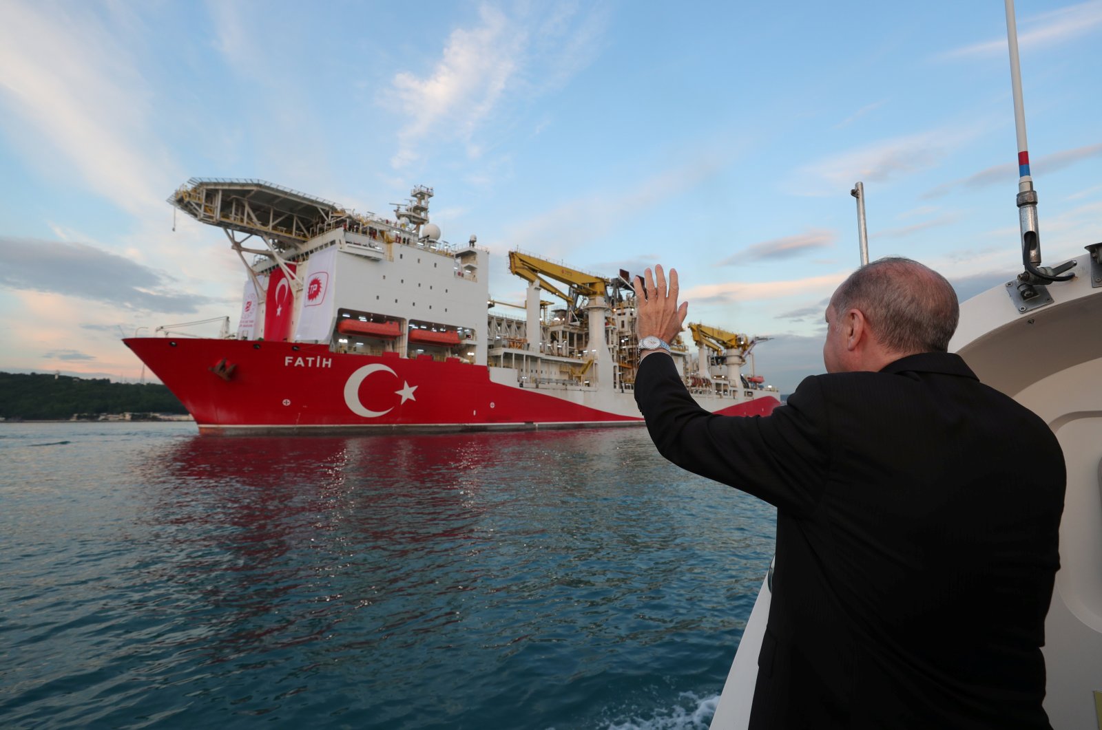 President Recep Tayyip Erdoğan waves as Turkey's drilling vessel Fatih departs for the Black Sea during a ceremony in Istanbul, Turkey, May 29, 2020. (Reuters Photo)