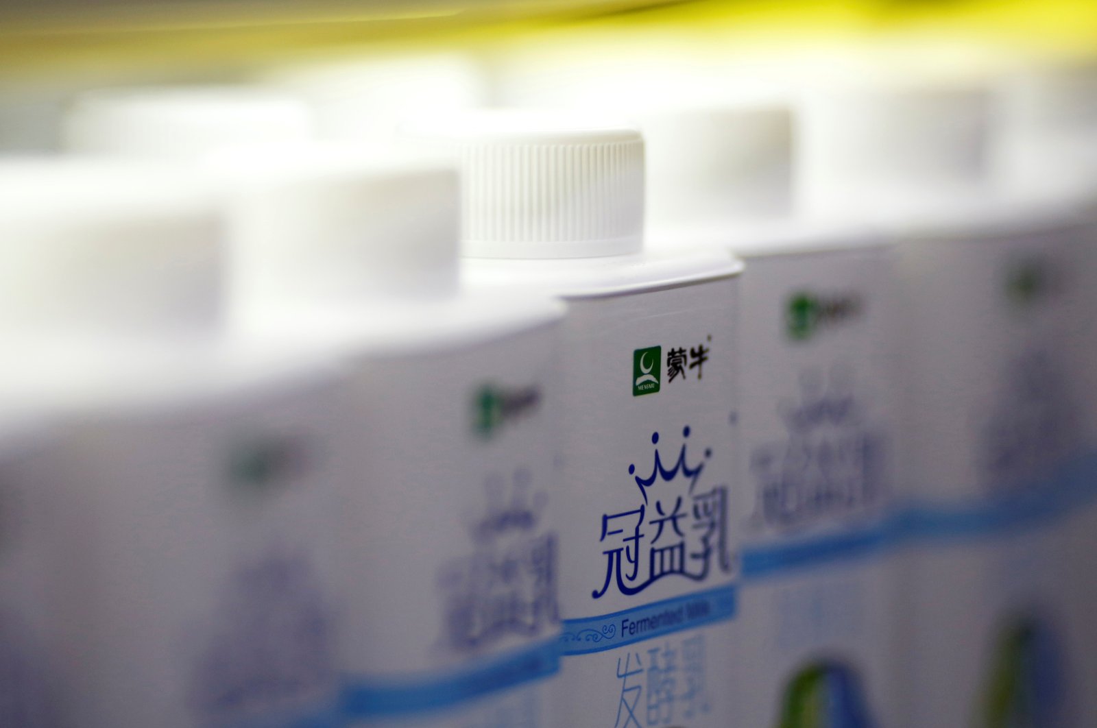 Mengniu milk products are displayed at a supermarket in Beijing, China, Feb. 13, 2014. (Reuters Photo)