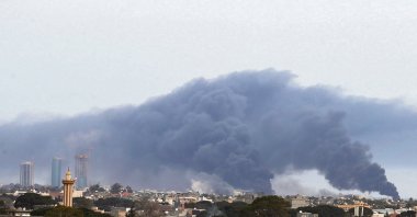 Plumes of smoke rise above buildings in the Libyan capital Tripoli, during reported shelling by putschist Gen. Khalifa Haftar's forces, May 9, 2020 (AFP File Photo)