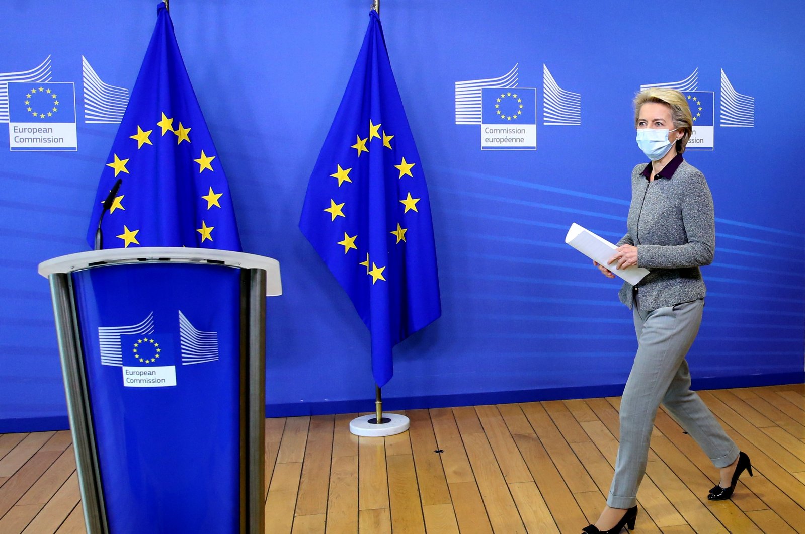 President of the European Commission Ursula von der Leyen, wearing a protective face mask, arrives for a media conference at EU headquarters in Brussels, Aug. 27, 2020. (AP Photo)