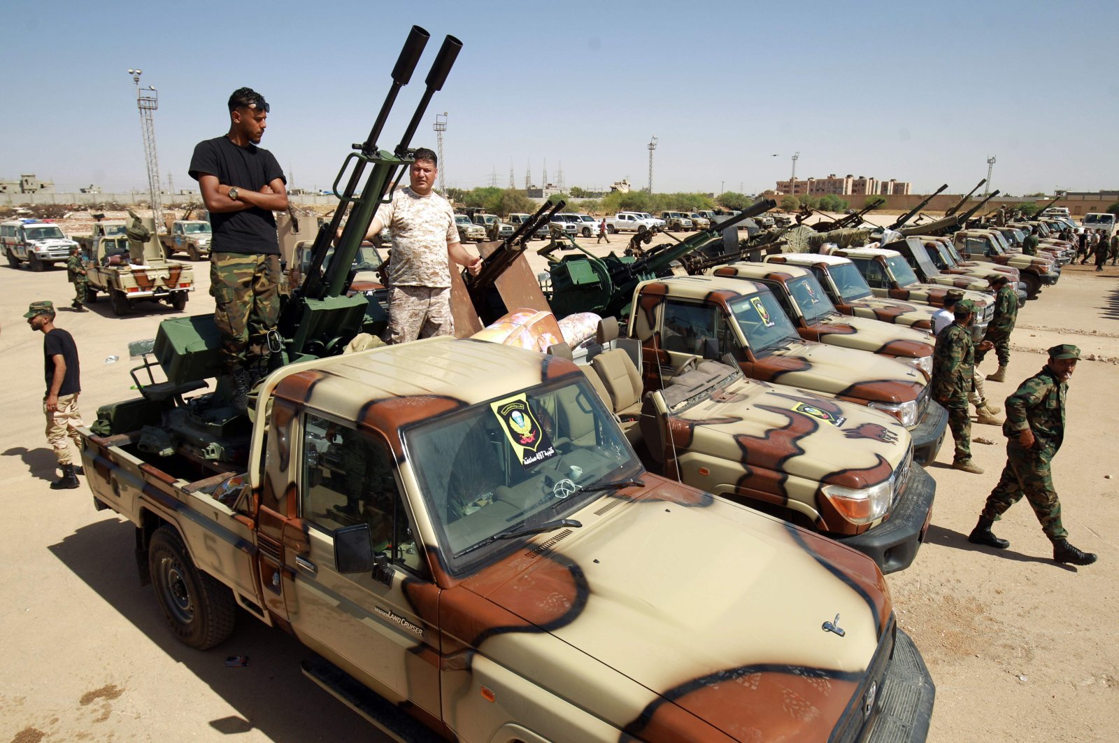 Forces loyal to putschist Gen. Khalifa Haftar gather in the city of Benghazi, on their way to back up fellow fighters on the front line west of the city of Sirte, Libya, June 18, 2020. (AFP Photo)