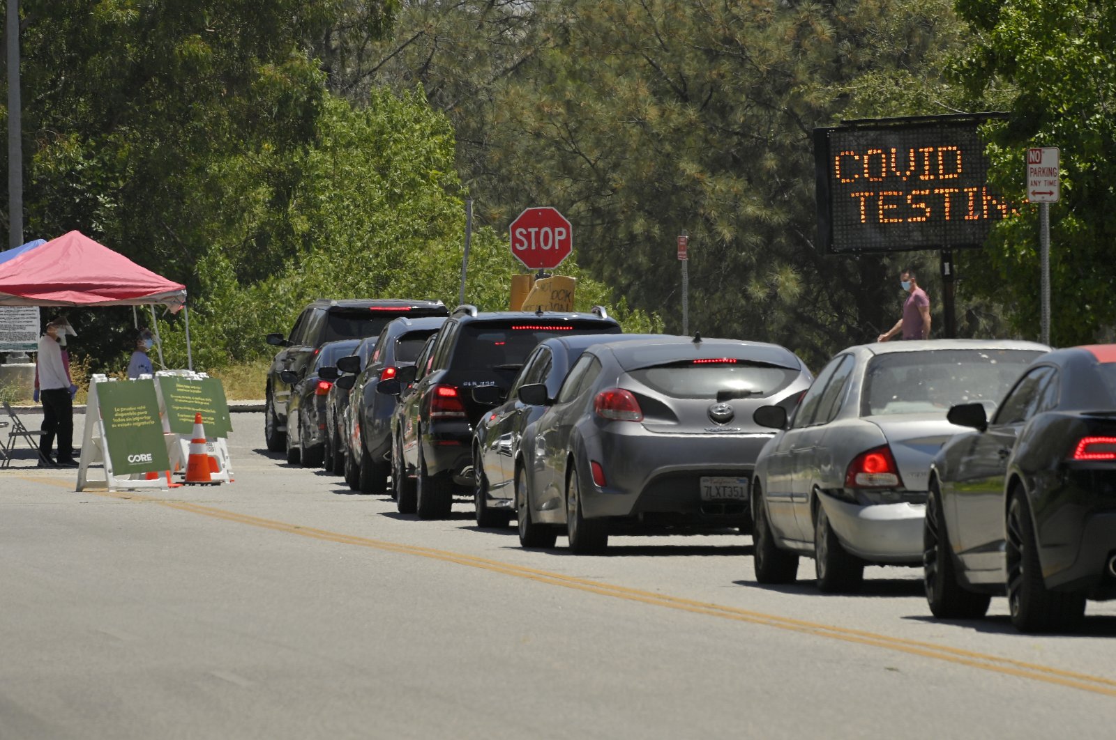 Cars line up for COVID-19 testing at Hansen Dam Recreation Center, Los Angeles. C.A., July 7, 2020. (AP Photo)