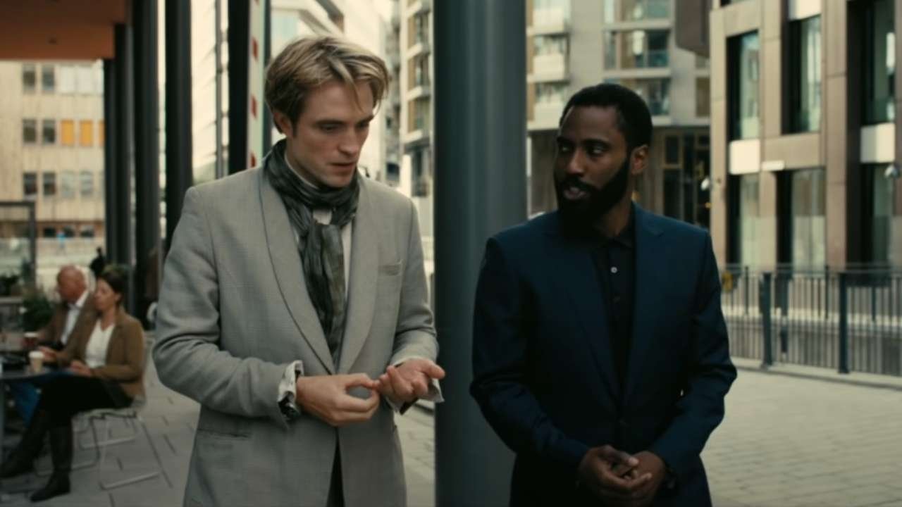 Robert Pattinson as Neil tells his plans about starting a fire in a cargo plane in Oslo to John David Washington in the role of The Protagonist in a scene from 'Tenet.'