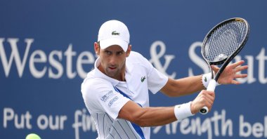 Novak Djokovic  returns a shot against Jan Leonard Struff during the Western & Southern Open, New York City, New York, U.S., Aug. 26, 2020. (AFP Photo)
