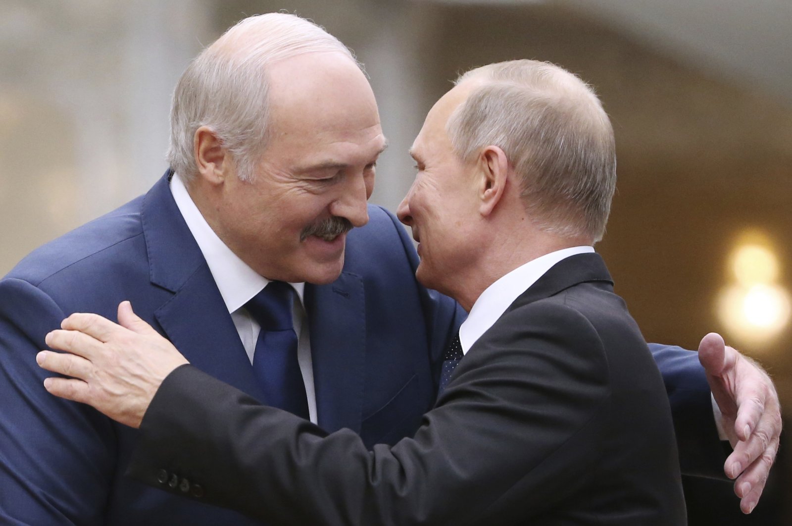 Belarusian President Alexander Lukashenko greets Russian President Vladimir Putin during the Collective Security Council of the Collective Security Treaty Organization (CSTO) summit, Minsk, Nov. 30, 2017. (AP Photo)