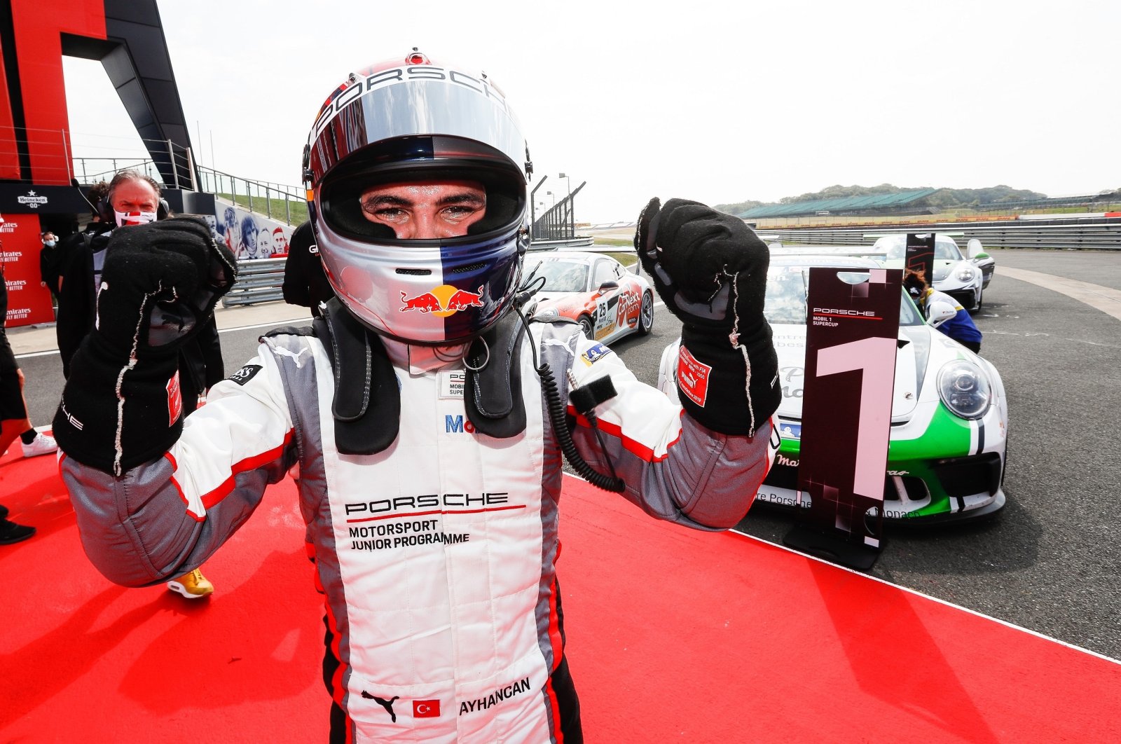 Ayhancan Güven gestures after winning the seventh round of the Porsche Mobil 1 Supercup in Stavelot, Belgium, Aug. 30, 2020. (AA Photo)