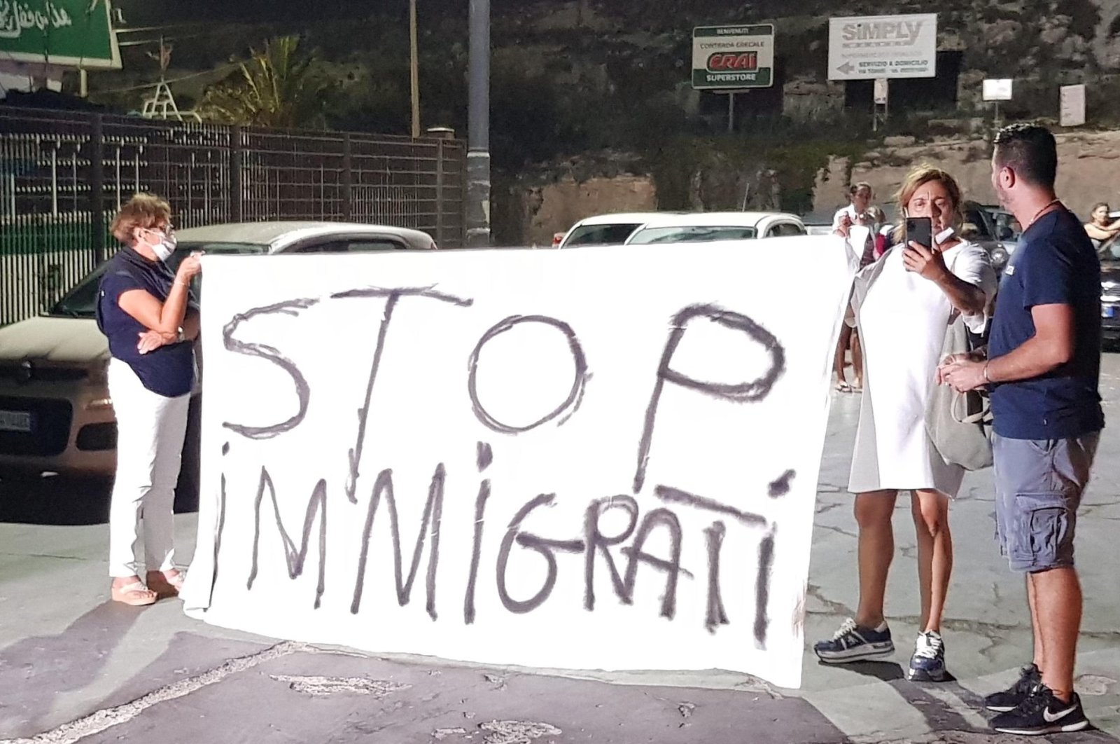 Residents protest against the continuing landings of migrants on the island of Lampedusa, Italy, Aug. 30, 2020. (EPA Photo)