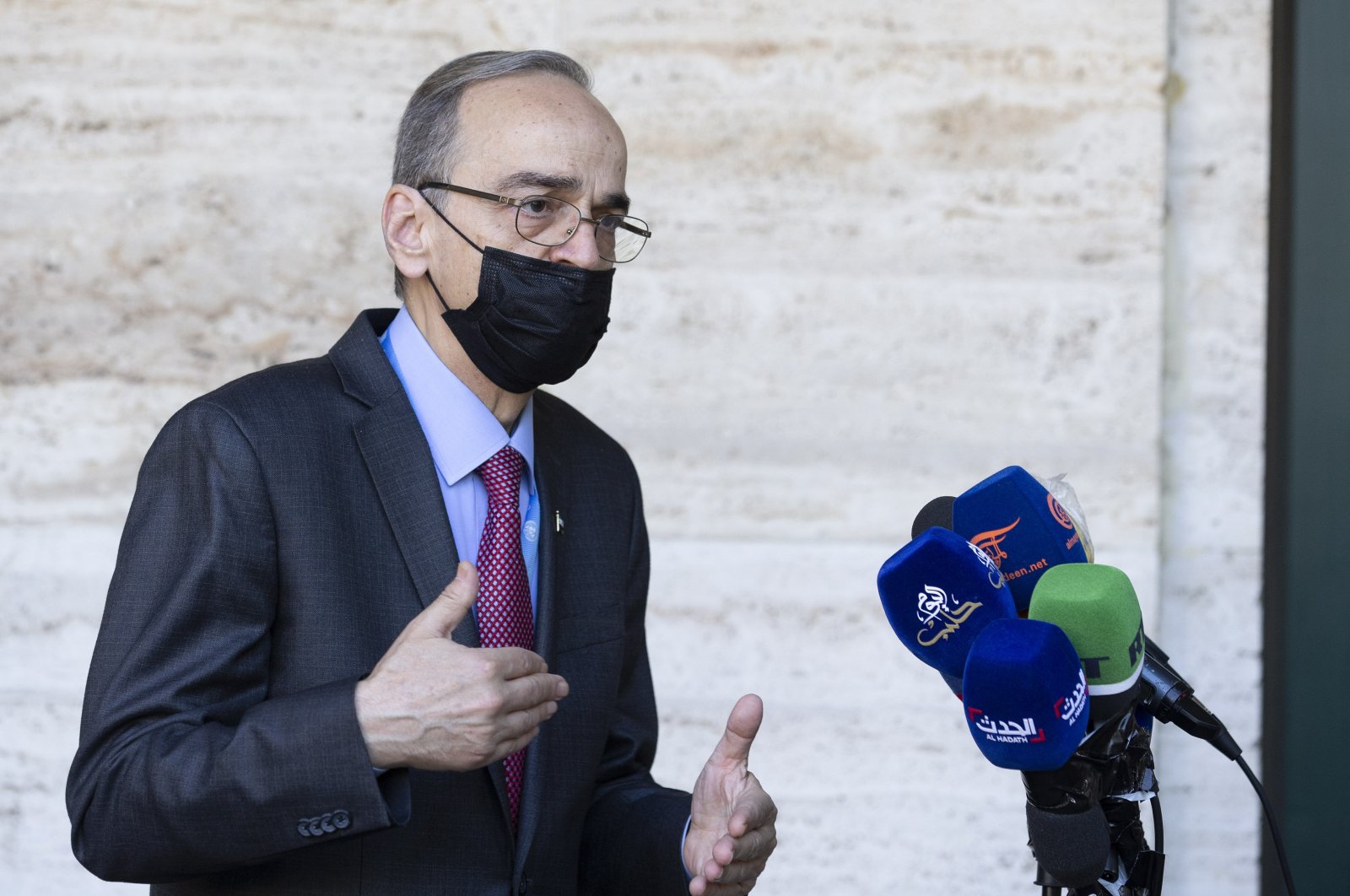 Constitutional Committee co-Chair Hadi al-Bahra speaks to reporters following the announcement of the suspension of the conference due to cases of COVID-19, at the European headquarters of the United Nations in Geneva, Switzerland, Aug. 24, 2020. (AP Photo)
