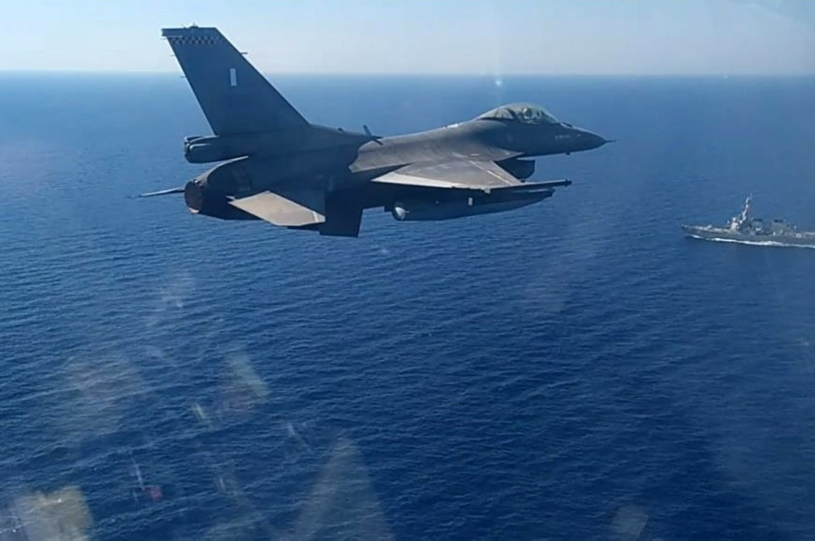 In this photo provided by the Greek Defense Ministry, a Greek air force jet takes part in a Greek-U.S. military exercise south of the island of Crete, Aug. 24, 2020 (Greek Defense Ministry via AP)