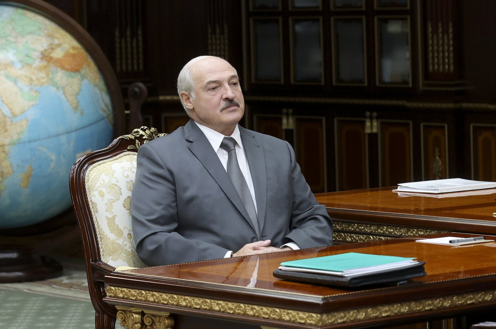 Belarusian President Alexander Lukashenko attends a meeting at the Supreme Court of Belarus, in Minsk, Belarus, Aug. 31, 2020. (AP Photo)