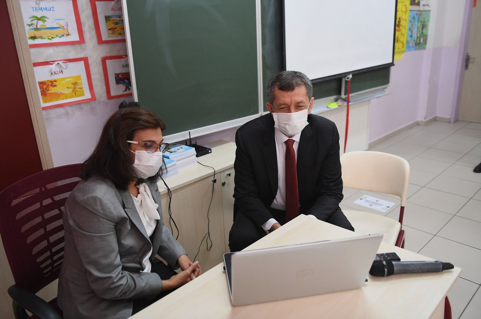 Education Minister Ziya Selçuk (R) joins an online class in a school in Ankara, Aug. 31, 2020. (AA Photo)