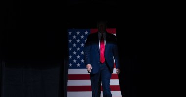 President Donald Trump arrives on stage to speak at a campaign rally at the BOK Center in Tulsa, Oklahoma, U.S., June 20, 2020. (AP Photo)