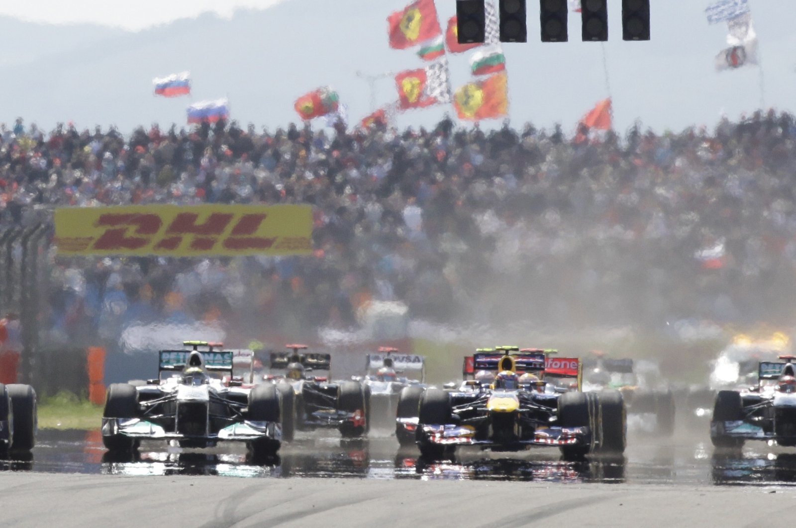 Red Bull driver Sebastian Vettel leads the field after the start of the Formula One Turkish Grand Prix at the Istanbul Park racetrack, in Istanbul, Turkey, May 8, 2011. (AP Photo)