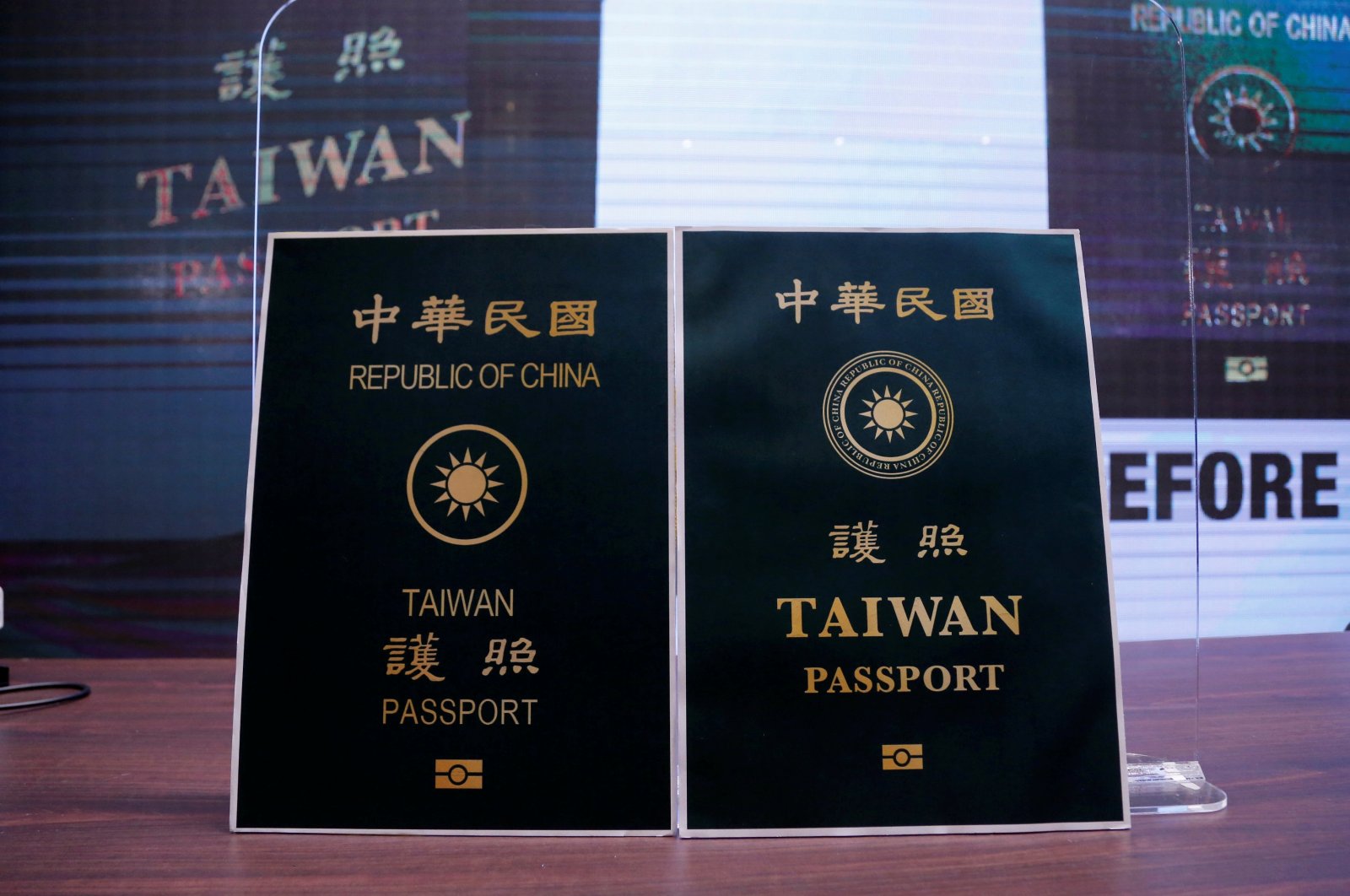 Paper cut-outs of the old and new (R) Taiwan passport are displayed in Taipei, Taiwan, Sept. 2, 2020. (Reuters Photo)