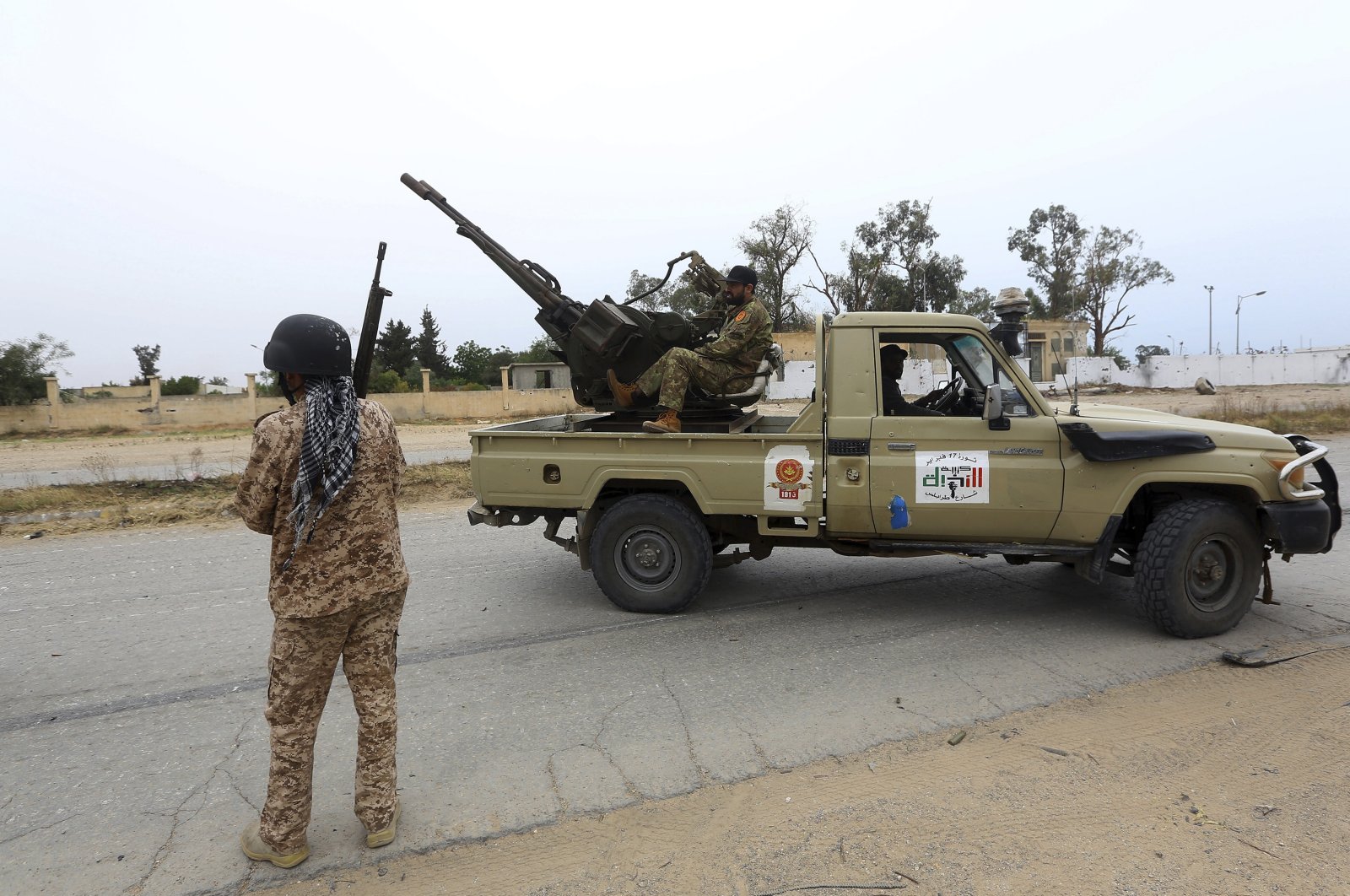 Libyan Army forces clash with putschist Gen. Haftar's militias, south of the capital Tripoli, Libya, May 19, 2019. (AP Photo)