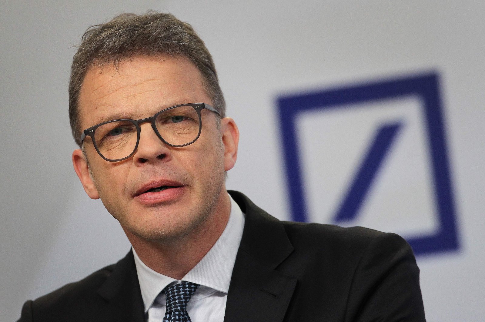 Christian Sewing, CEO of Deutsche Bank, addresses journalists at the group's headquarters in Frankfurt am Main, western Germany, Jan. 30, 2020. (AFP Photo)