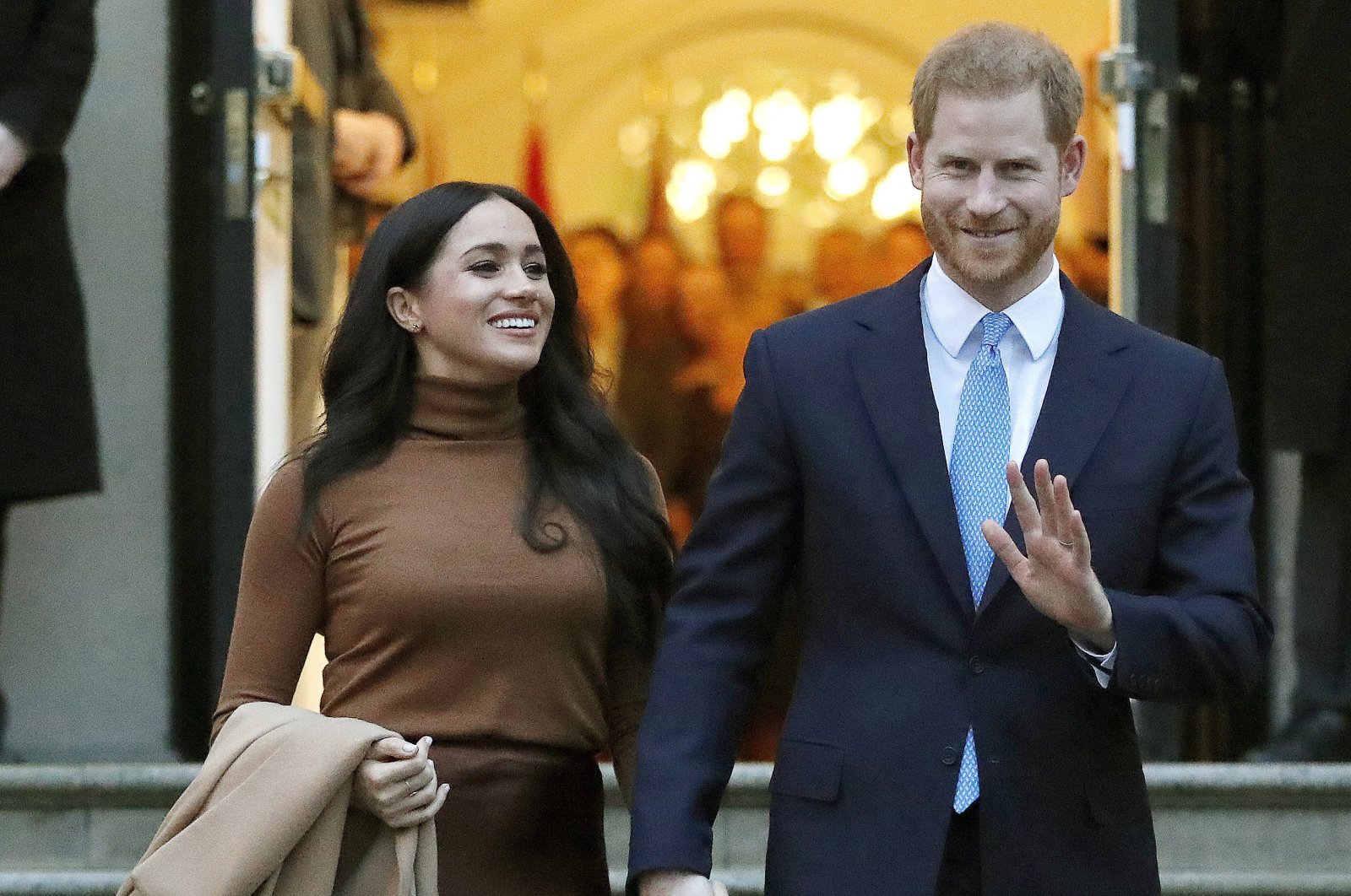 In this file photo, Britain's Prince Harry and Meghan, Duchess of Sussex, leave Canada House in London, Jan. 7, 2020. (AP Photo)