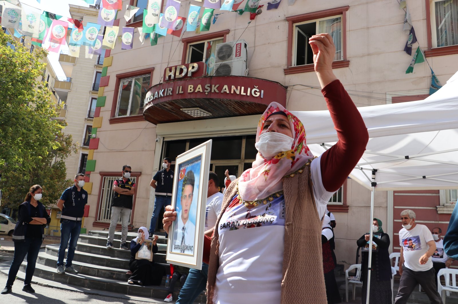 One of the mothers whose son was abducted and forcibly recruited by the PKK protests in front of the HDP headquarters in Diyarbakır, southeastern Turkey, Sept. 3, 2020. (AA Photo)