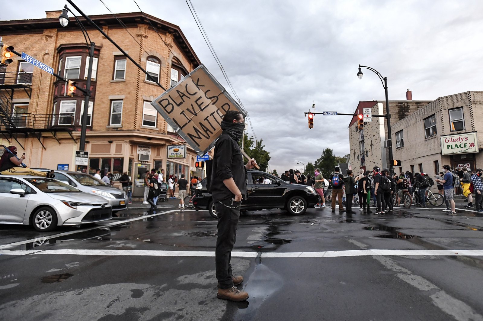 A crowd of protesters gather near the site where Daniel Prude was restrained by police officers, Rochester, N.Y., Sept. 2, 2020. (AP Photo)