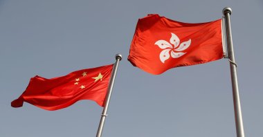 The Chinese and Hong Kong flags flutter at the office of the Government of the Hong Kong Special Administrative Region, ahead of a news conference held by Hong Kong Chief Executive Carrie Lam, in Beijing, China June 3, 2020. (Reuters Photo)