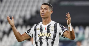 Juventus' Cristiano Ronaldo gestures during a Champions League match against Lyon, in Turin, Italy, Aug. 7, 2020. (AP Photo)