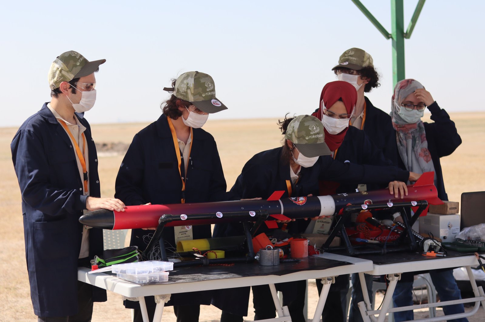 Sixteen-year-old Emirhan Kayiş (2nd from L) works with his team "Halley's Apprentices" during the Teknofest Rocket Competition in Turkey's central Aksaray province, Sept. 4, 2020. (Daily Sabah Photo)