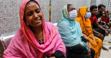 Relatives of victims of a suspected gas explosion mourn in a hospital in Dhaka, Bangladesh on Sept. 5, 2020. (AFP Photo)