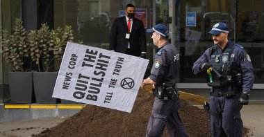 A pile of "manure" is dumped outside the News Corp Australia offices in Sydney, Australia, Sept. 4, 2020. (EPA Photo)