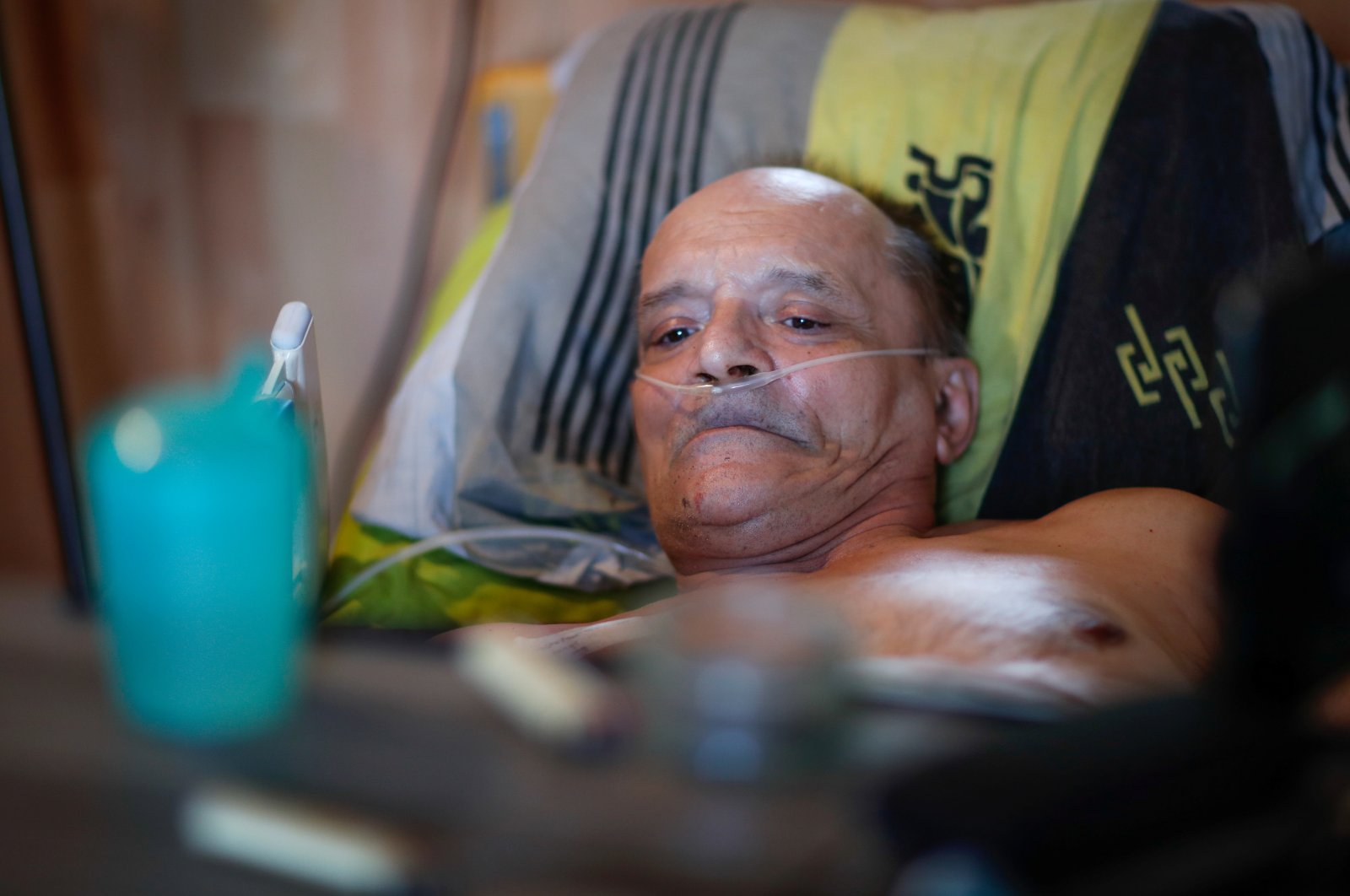 Alain Cocq, 57, in the medical bed he has been confined to for years as a result of a degenerative disease that has no treatment, poses after an interview with Reuters at his home in Dijon, France, Aug. 19, 2020. (Reuters Photo)
