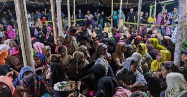 Rohingya refugees rest after the boat carrying them landed, Lhokseumawe, Aceh province, Indonesia, Sept. 7, 2020. (AP Photo)
