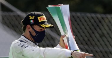 AlfaTauri driver Pierre Gasly of France celebrates winning the Italian Formula One Grand Prix, in Monza, Italy, Sept. 6, 2020. (Reuters Photo)