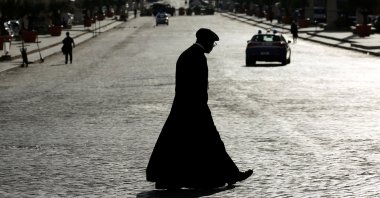 A priest is silhouetted along Via della Conciliazione street, near Vatican City, at the first weekly general audience led by Pope Francis, open to the public for the first time since the global outbreak of COVID-19, in Rome, Italy, Sept. 2, 2020. (Reuters Photo)