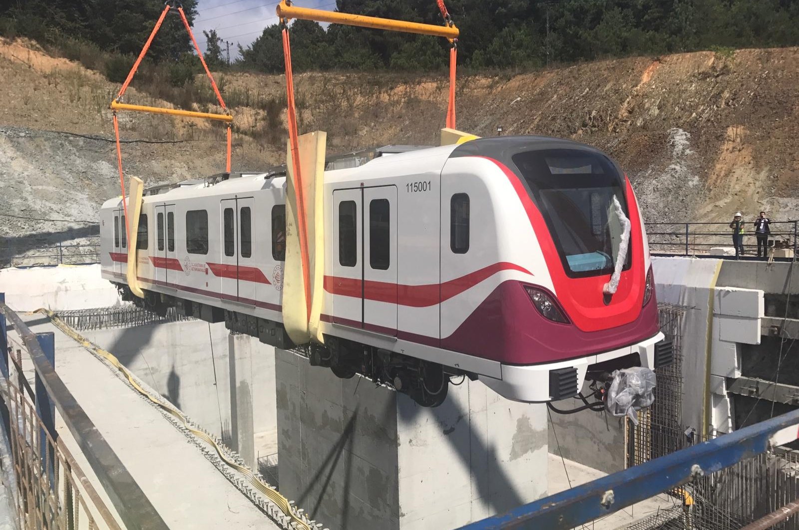 The first subway car is laid on the tracks of the Gayrettepe-Istanbul Airport metro line, Istanbul, Turkey, Sept. 6, 2020. (AA Photo)