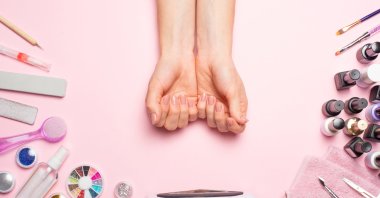 As germs can hide in cracked or chipped nail polish, it is important you remove it when you see signs of wear. (Shutterstock Photo)