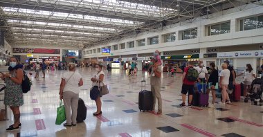 Tourists seen in a line at the Antalya Airport in southern Antalya, Turkey, Sept. 9, 2020. (DHA Photo)
