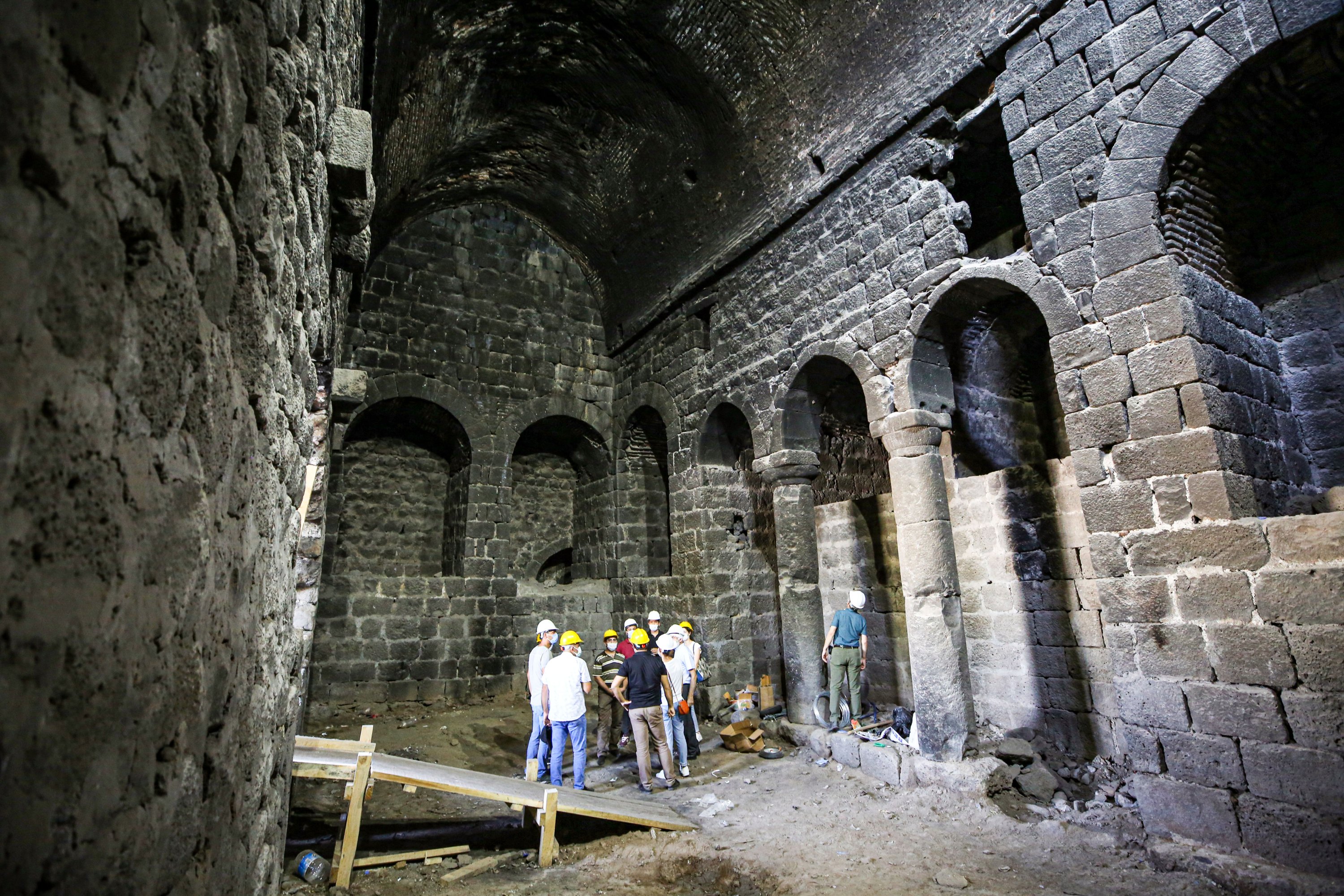 Restorers examine the interior of the city walls in Diyarbakır, southeastern Turkey, Sept. 9, 2020. (AA PHOTO)