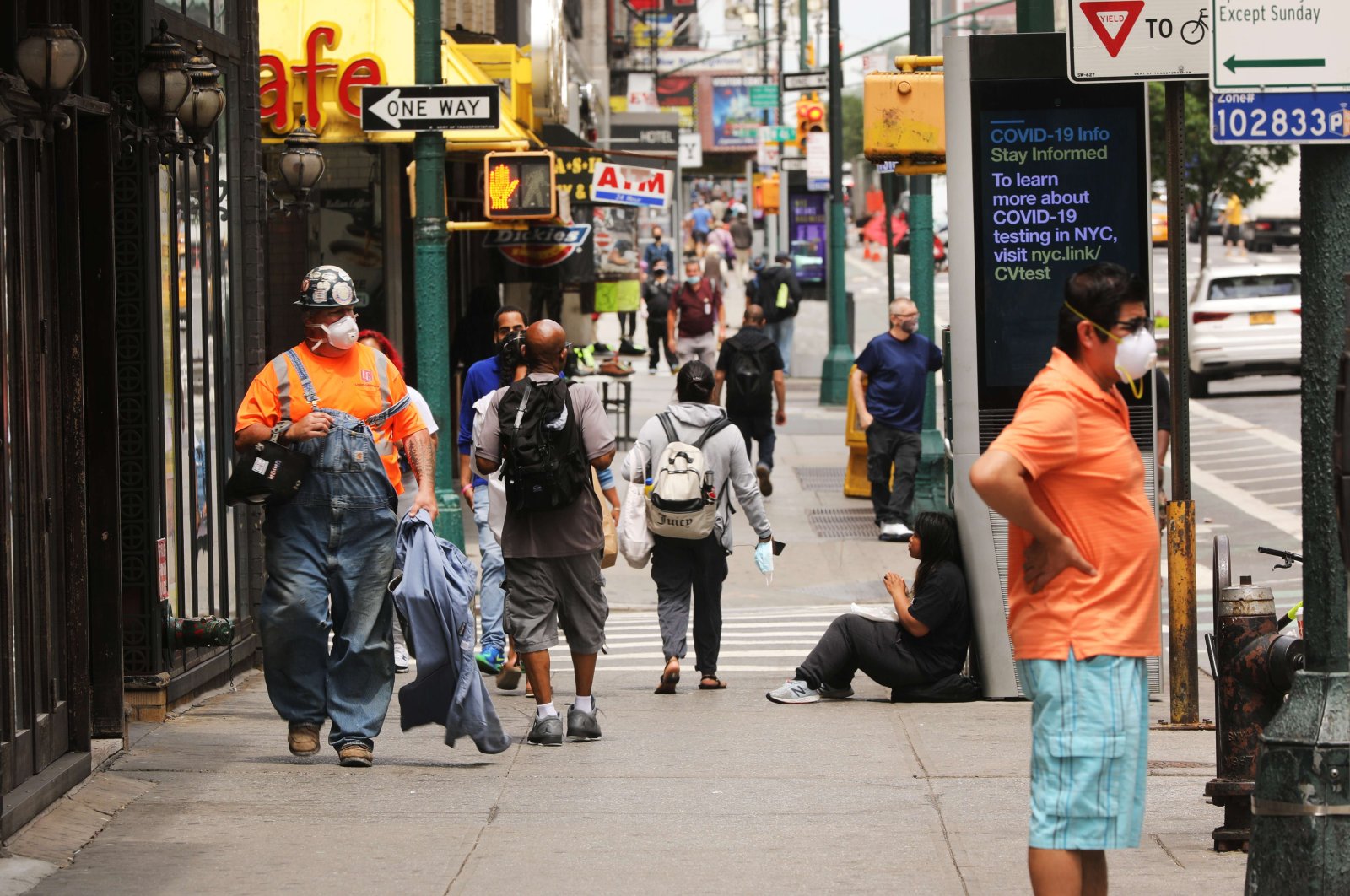 People are seen walking through Manhattan in New York City, U.S., June 18, 2020. (AFP Photo)