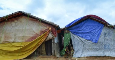 Rohingya children play in front of their makeshift home at Kutupalong refugee camp in Ukhia, Cox's Bazar, Bangladesh, July 24, 2019. (AFP Photo)