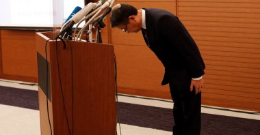 Mitsui O.S.K. Lines President and Chief Executive Officer (CEO) Junichiro Ikeda bows his head to apologize during a news conference about its measures to help recover environment and provide contributions to local communities after the MV Wakashio, chartered by the shipping company, ran aground on a reef in Mauritius in July, at his headquarters in Tokyo, Japan September 11, 2020. (Reuters Photo)