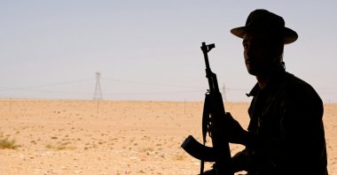A member of the Libyan National Army (LNA) commanded by warlord Khalifa Haftar sits in a tent at one of their sites in west of Sirte, Libya Aug. 19, 2020. (Reuters Photo)